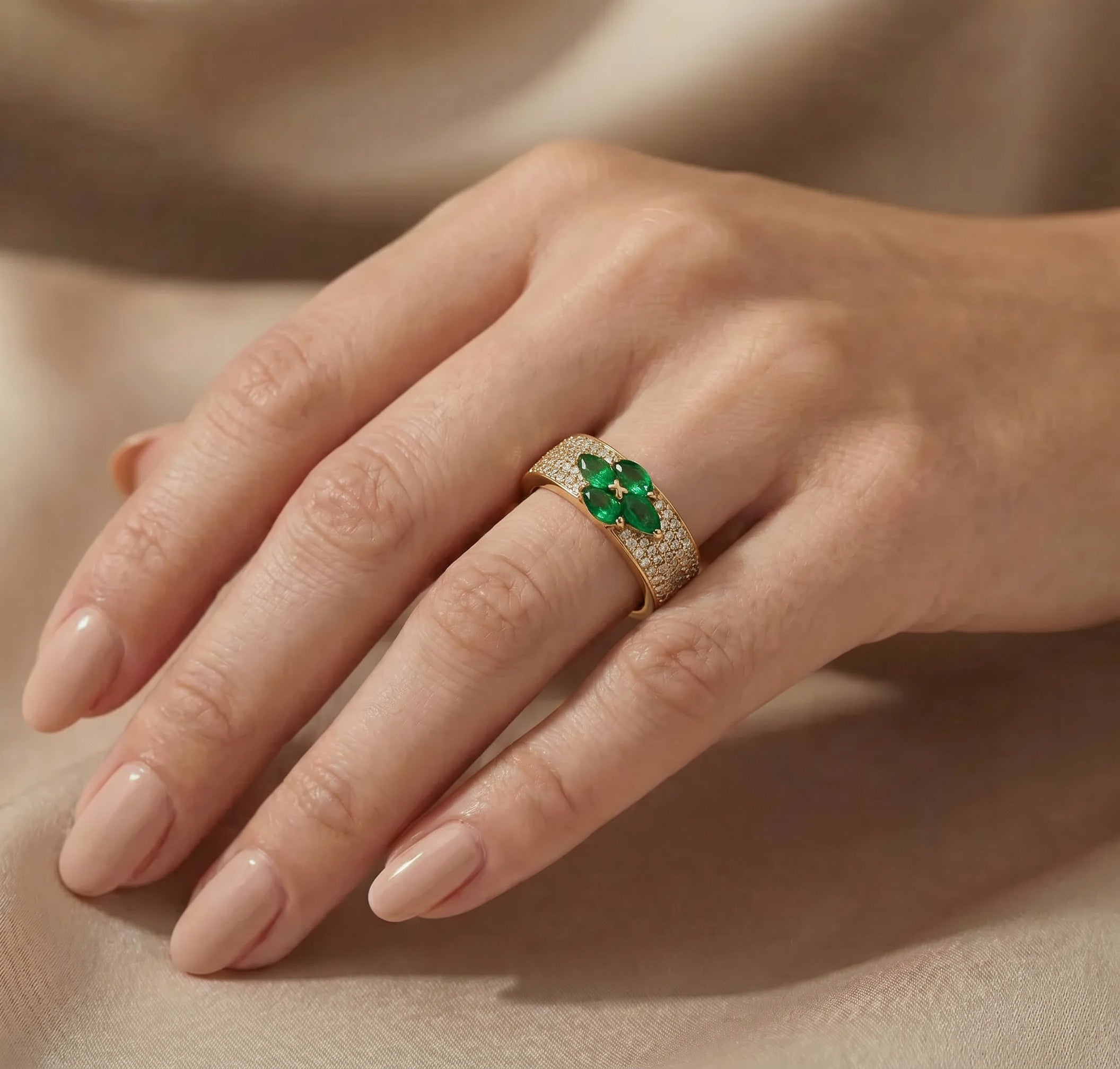 Four Emeralds, One Ring